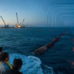 Global underwater rail corridor to link continents hailed as progress while opponents brand it an arrogant assault on the oceans